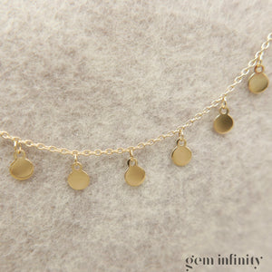 Yellow gold tassel necklace