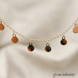 Yellow gold tassel necklace