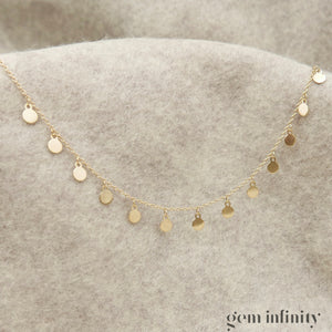 Yellow gold tassel necklace