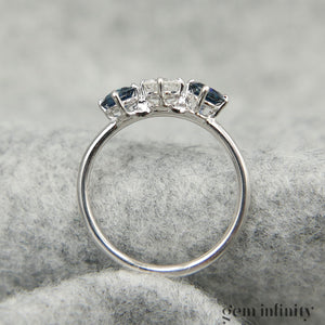 White gold, diamond and sapphire ring