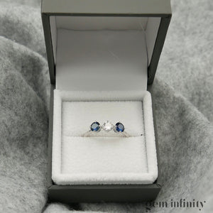 White gold, diamond and sapphire ring