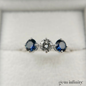 White gold, diamond and sapphire ring