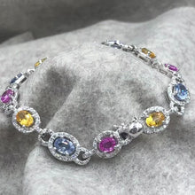 Load and play the video in Gallery viewer, White gold bracelet, colored sapphires and diamonds
